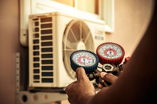 Professional Heat Pump Repair technician working in Patriot, IN